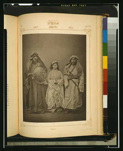 Studio portrait of models wearing traditional clothing from the province of Bagd, 1873