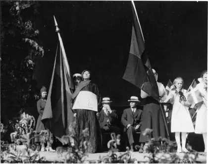 Women in traditional Russian dress performing in the "Pageant of Democracy" at W, 1920
